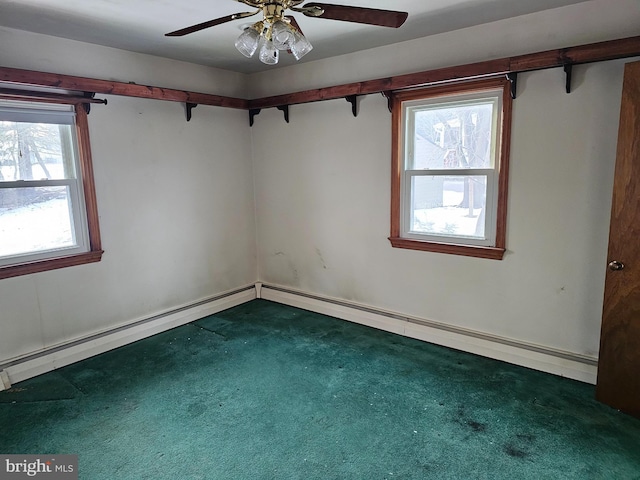 carpeted spare room with ceiling fan