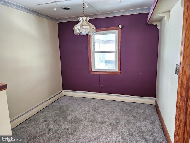 unfurnished room with carpet flooring and baseboard heating