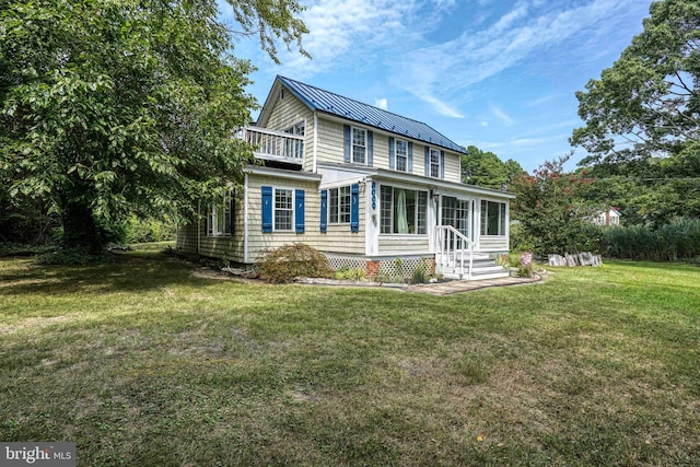 view of front facade with a front lawn