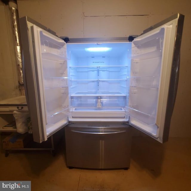 interior details featuring refrigerator