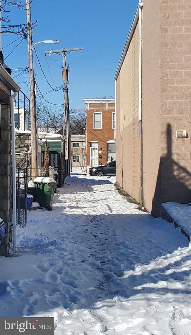 view of yard layered in snow