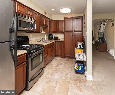 kitchen with stainless steel appliances and sink