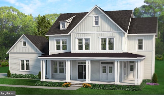 view of front of property featuring a porch and a front yard