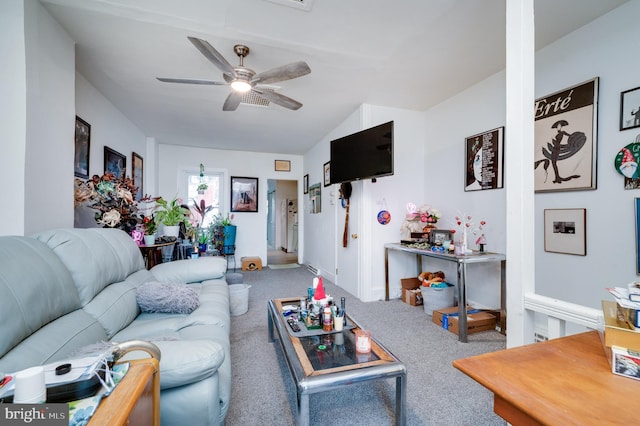 carpeted living room featuring lofted ceiling and ceiling fan