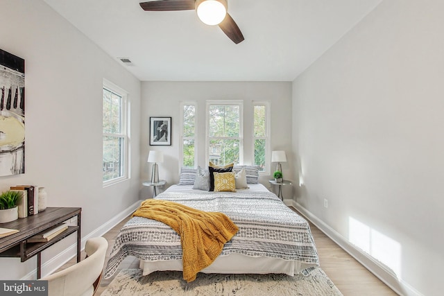 bedroom featuring ceiling fan and light wood-type flooring