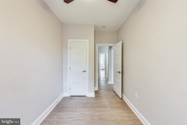 corridor featuring light hardwood / wood-style floors