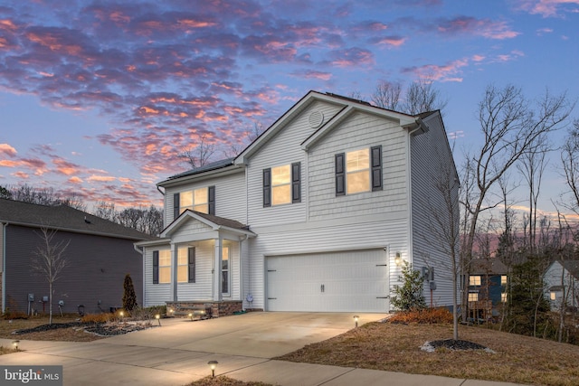 view of property featuring a garage