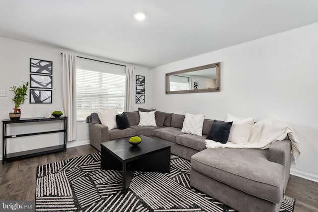 living room featuring dark hardwood / wood-style floors