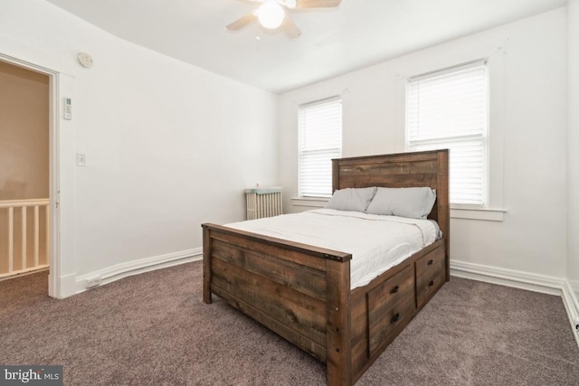 bedroom with dark carpet and ceiling fan