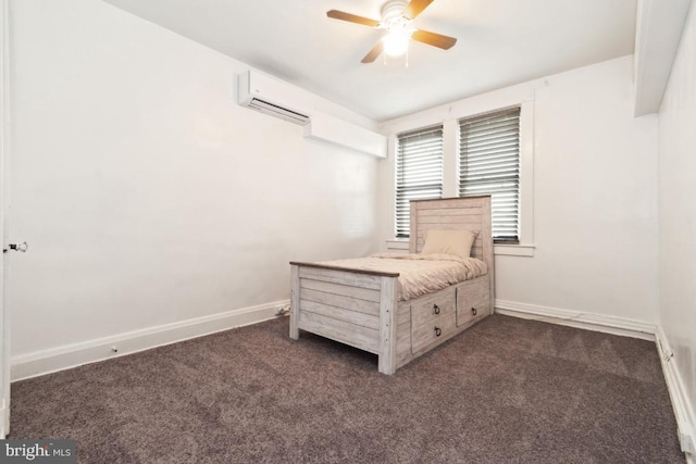 unfurnished bedroom featuring an AC wall unit, ceiling fan, and dark colored carpet