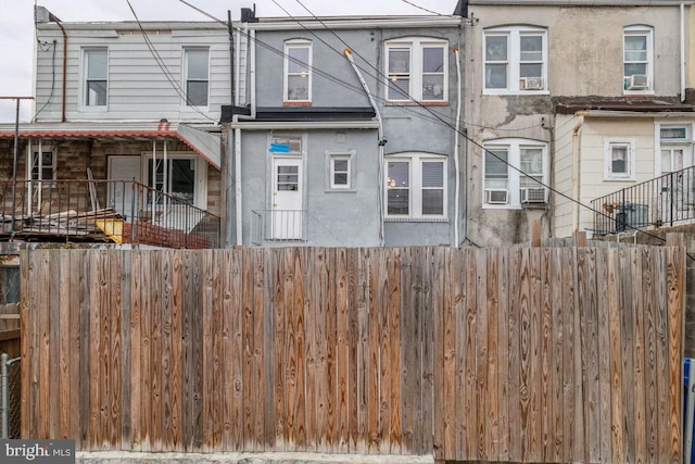 view of front of home with cooling unit