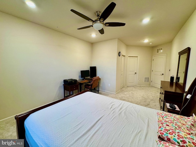 bedroom featuring ceiling fan and light colored carpet