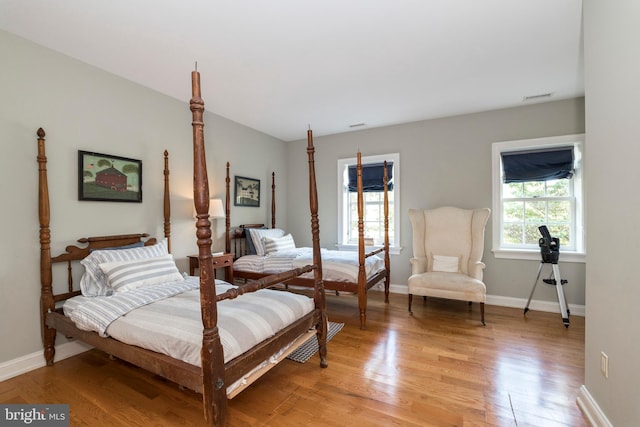 bedroom with light wood-type flooring