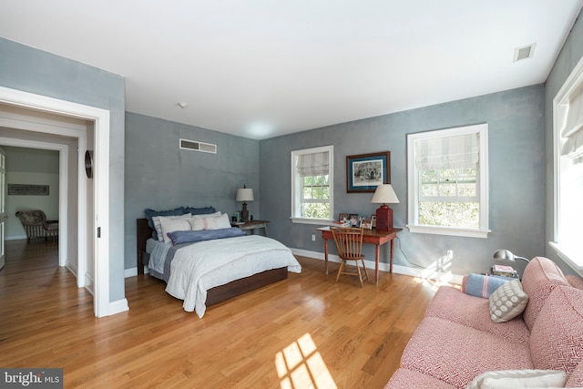 bedroom with light hardwood / wood-style flooring