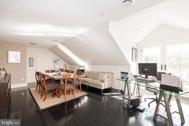 office featuring lofted ceiling and dark hardwood / wood-style flooring