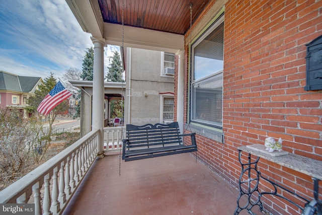 balcony featuring a porch