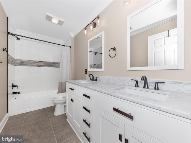 full bathroom featuring shower / tub combo with curtain, tile patterned floors, toilet, vanity, and ornamental molding