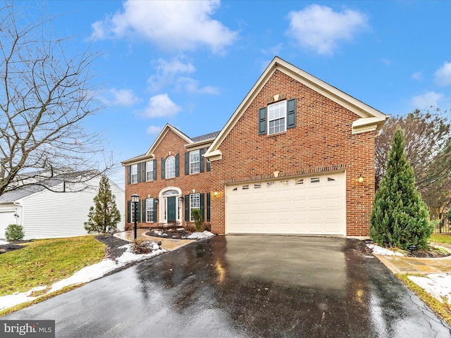 front of property featuring a garage