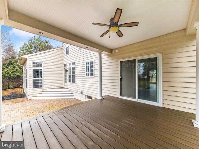 wooden terrace with ceiling fan