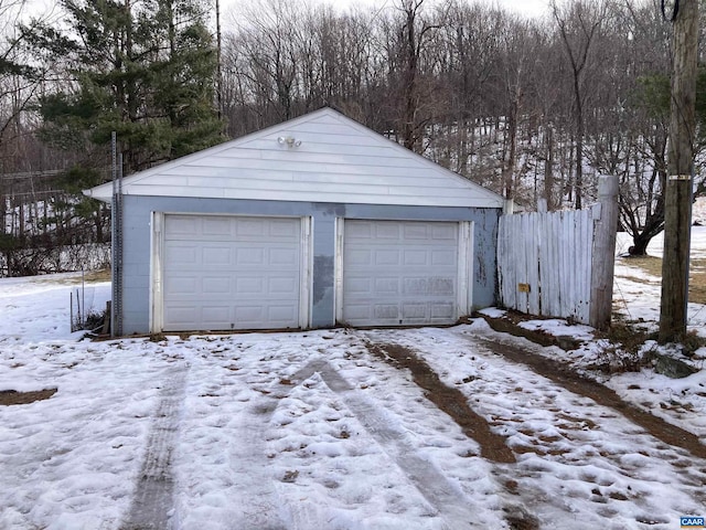 view of snow covered garage