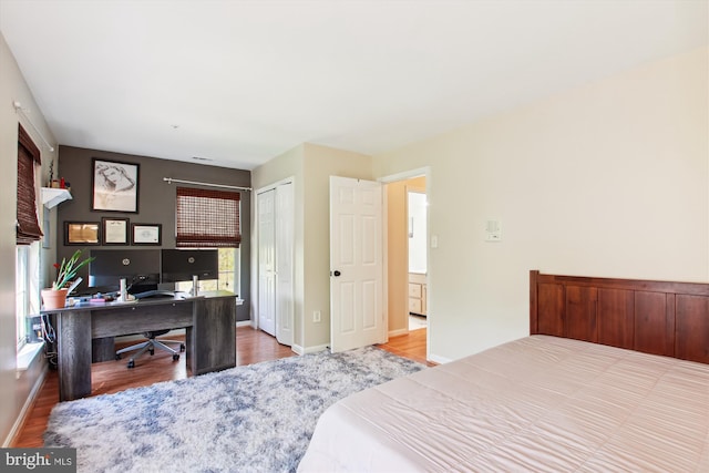 bedroom featuring hardwood / wood-style flooring