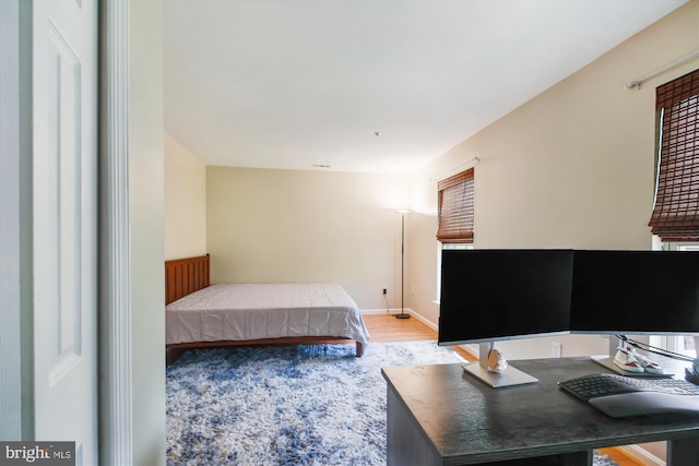 bedroom featuring hardwood / wood-style floors