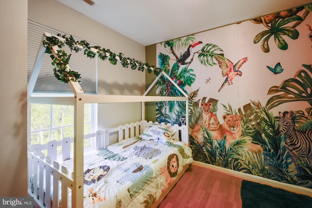 bedroom featuring wood-type flooring