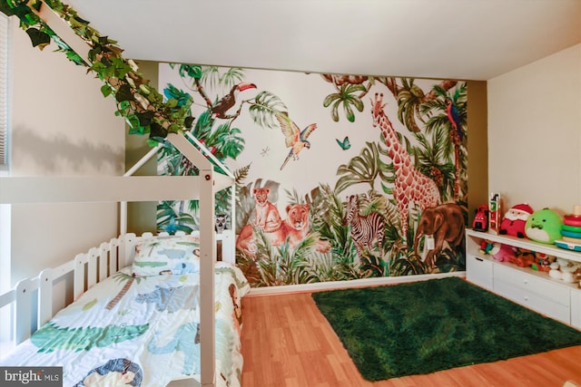 bedroom featuring wood-type flooring