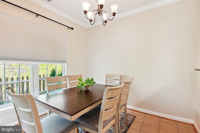 dining room with light tile patterned floors, a notable chandelier, and ornamental molding