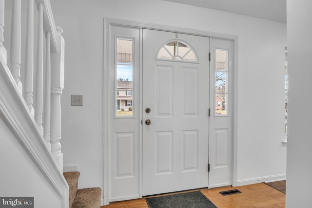 foyer featuring light hardwood / wood-style flooring and plenty of natural light