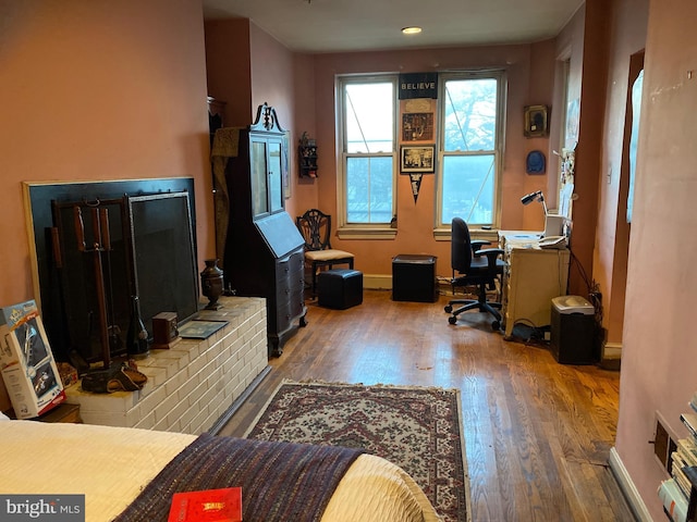 office area with dark hardwood / wood-style flooring