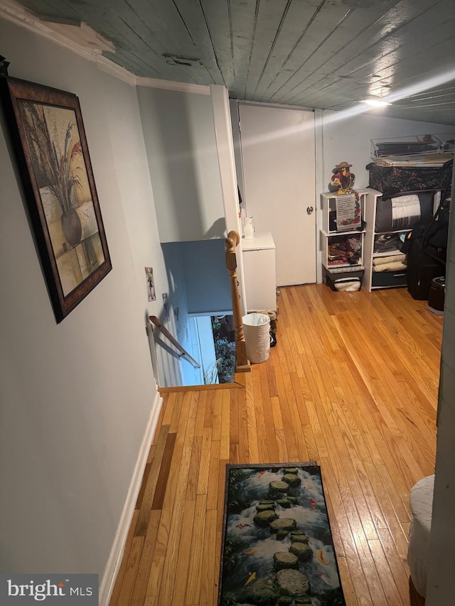 corridor featuring hardwood / wood-style flooring