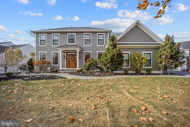 view of front of property featuring a front lawn