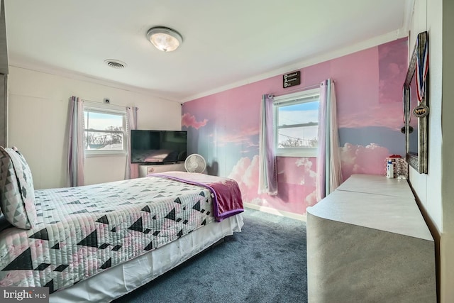 carpeted bedroom with multiple windows and ornamental molding