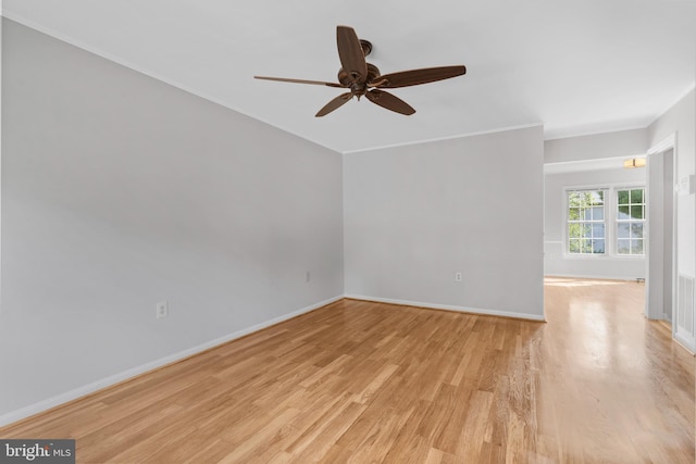 unfurnished room featuring light hardwood / wood-style flooring and ceiling fan