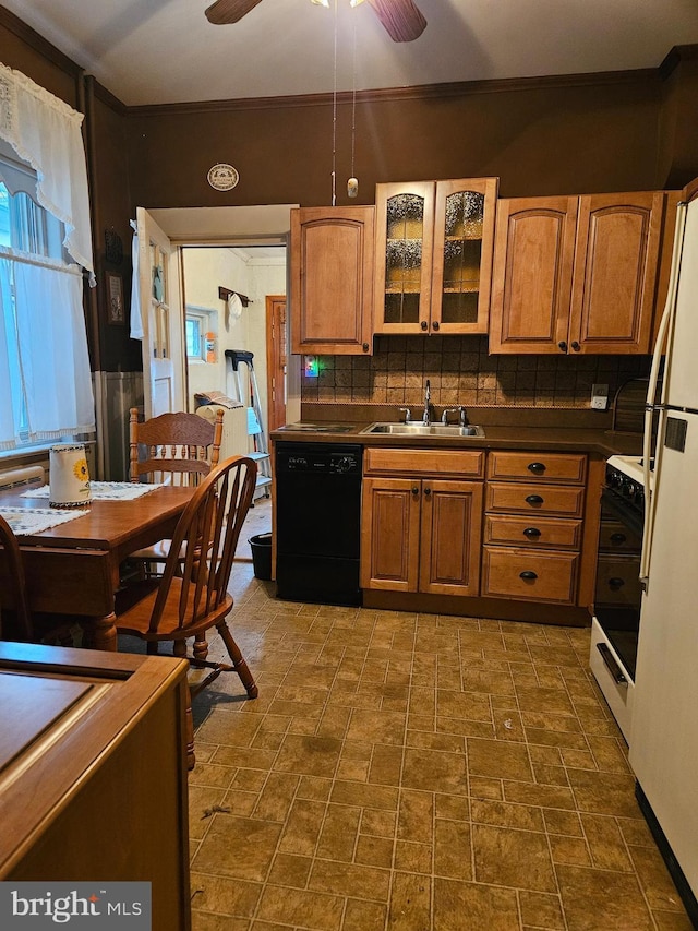 kitchen with range with gas stovetop, tasteful backsplash, black dishwasher, sink, and ceiling fan