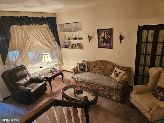 living area with carpet flooring and built in features