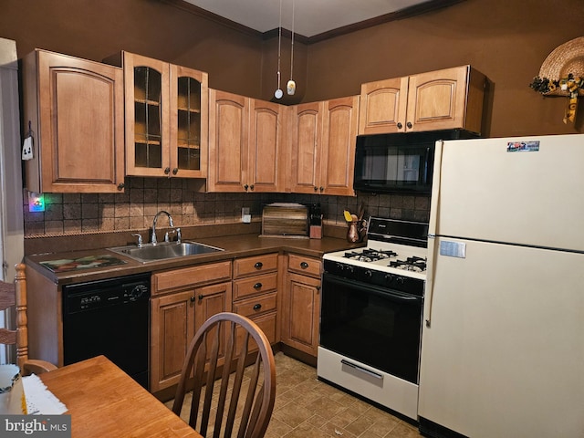 kitchen featuring tasteful backsplash, sink, ornamental molding, and black appliances