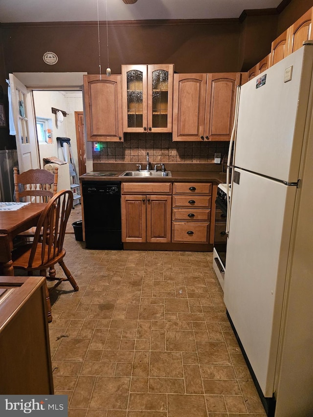 kitchen featuring sink, range, white refrigerator, dishwasher, and backsplash