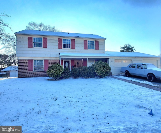 front of property with a garage