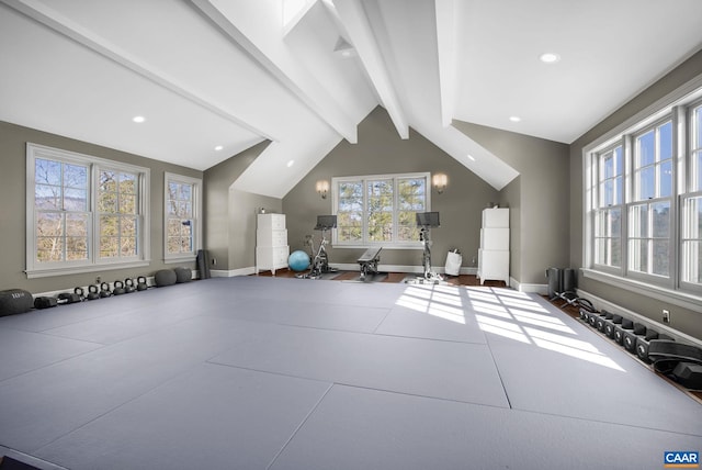 exercise room with vaulted ceiling