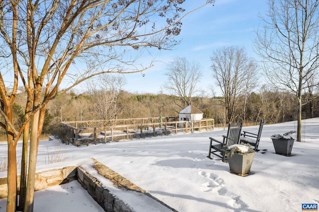 view of yard covered in snow