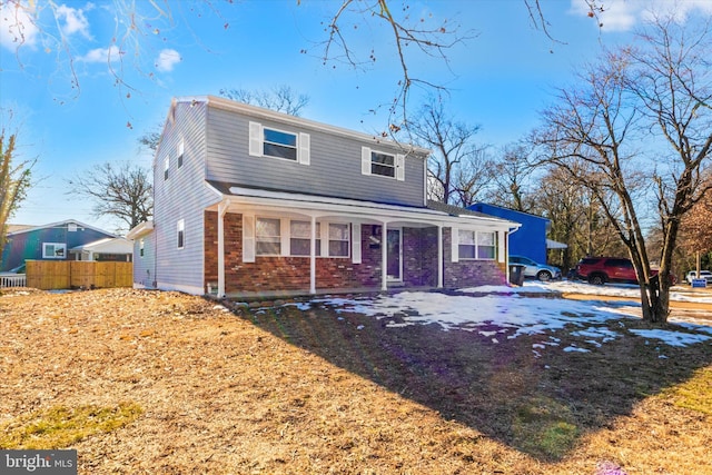 view of property with a porch