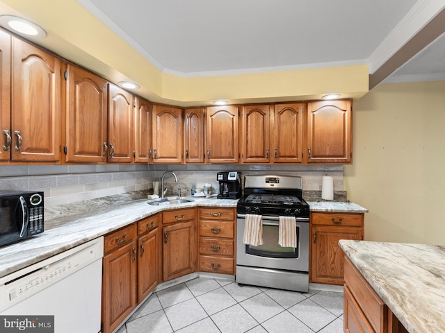 kitchen with gas range, dishwasher, sink, and ornamental molding