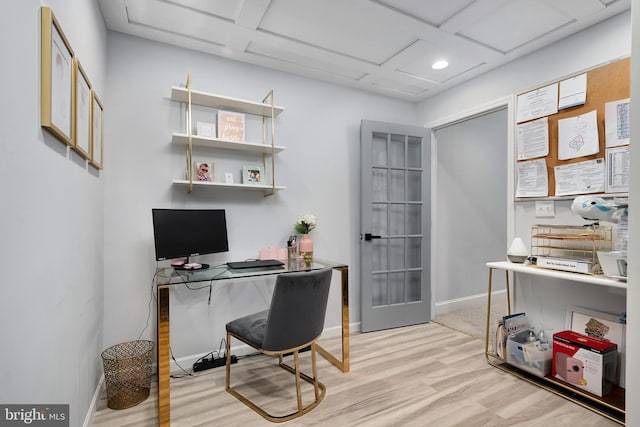 office space with light hardwood / wood-style flooring