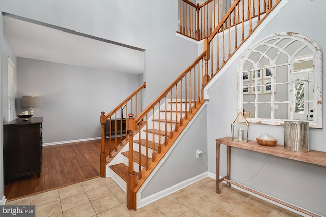 staircase with tile patterned flooring