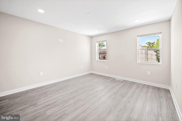 empty room featuring light hardwood / wood-style floors