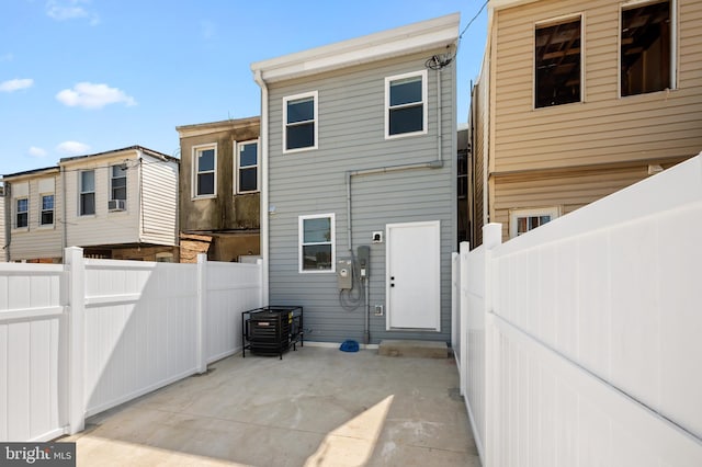 back of house with a patio area