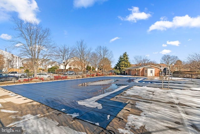 view of swimming pool with a patio area