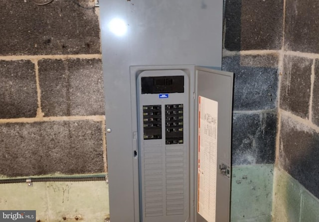 utility room featuring electric panel